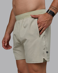 Man wearing Challenger 6" Lined Performance Shorts - Sustained Grey | Thumbnail Index: 4