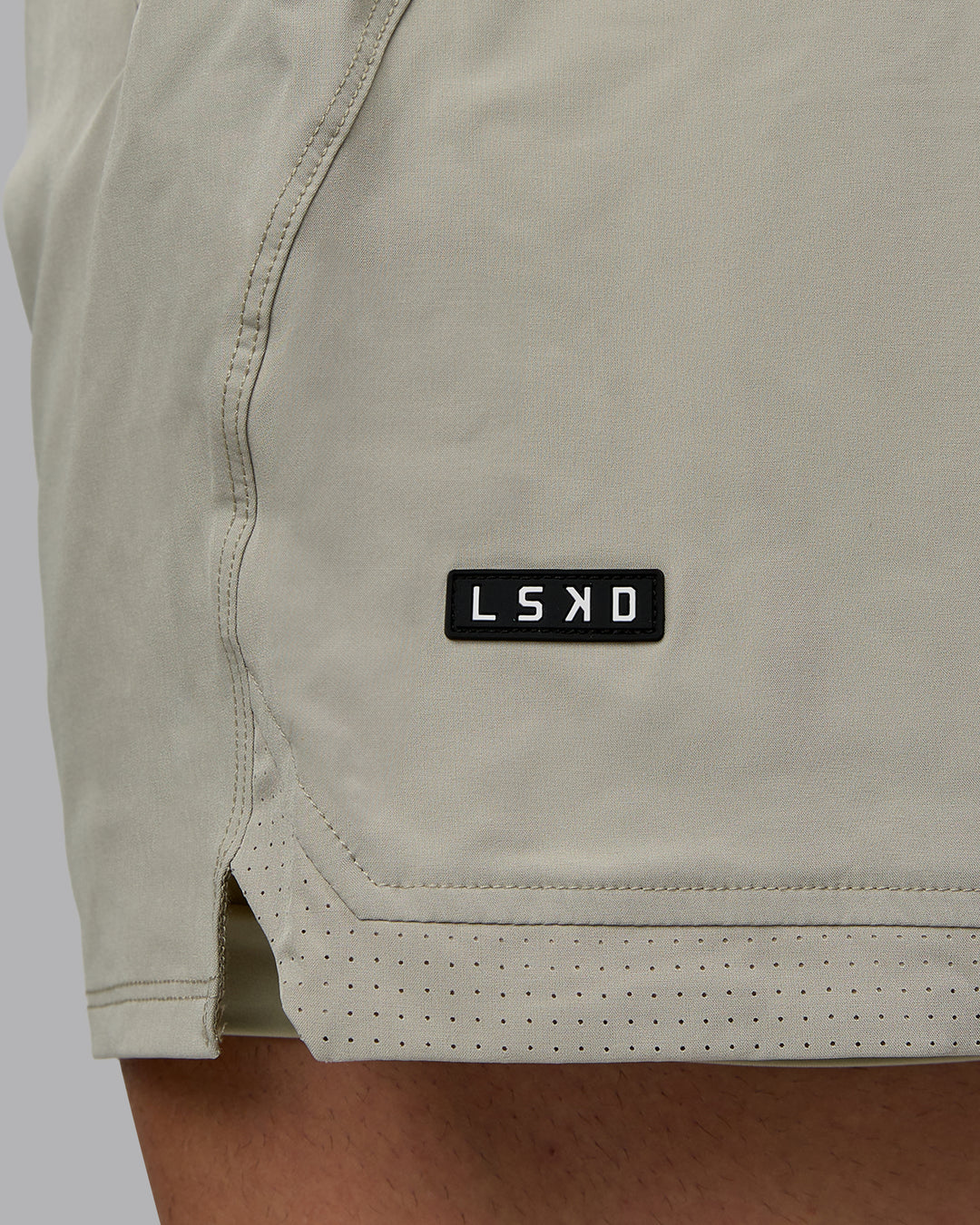 Man wearing Challenger 6" Lined Performance Shorts - Sustained Grey - view 7