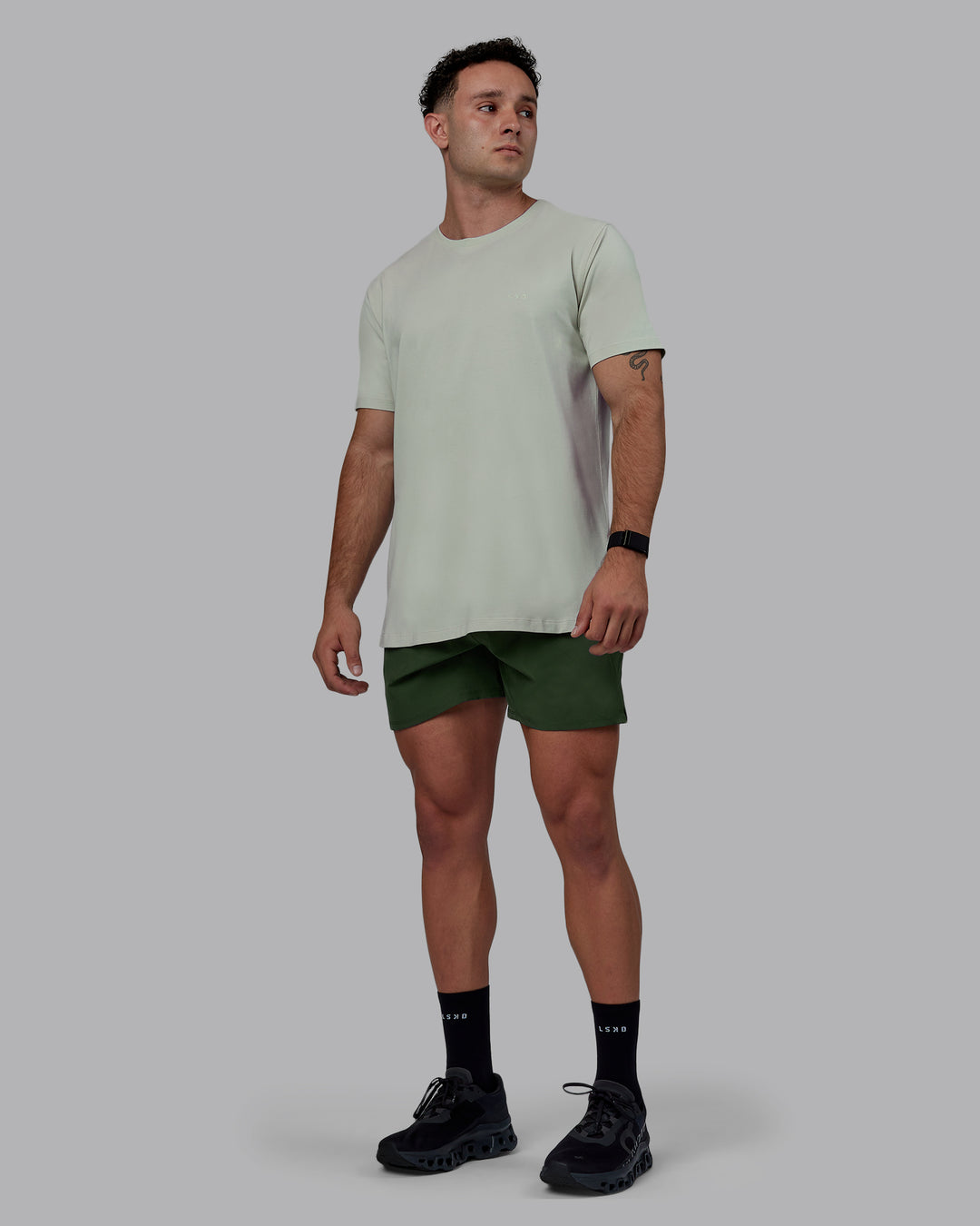 Man wearing Challenger 6" Performance Shorts - Cilantro - view 6