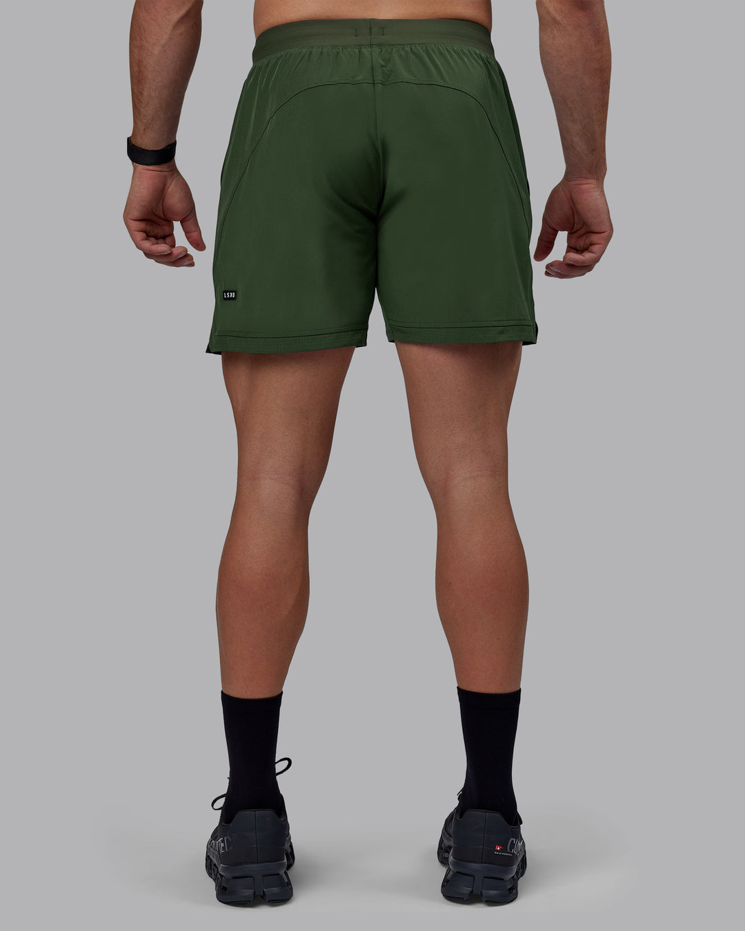 Man wearing Challenger 6" Performance Shorts - Cilantro - view 4