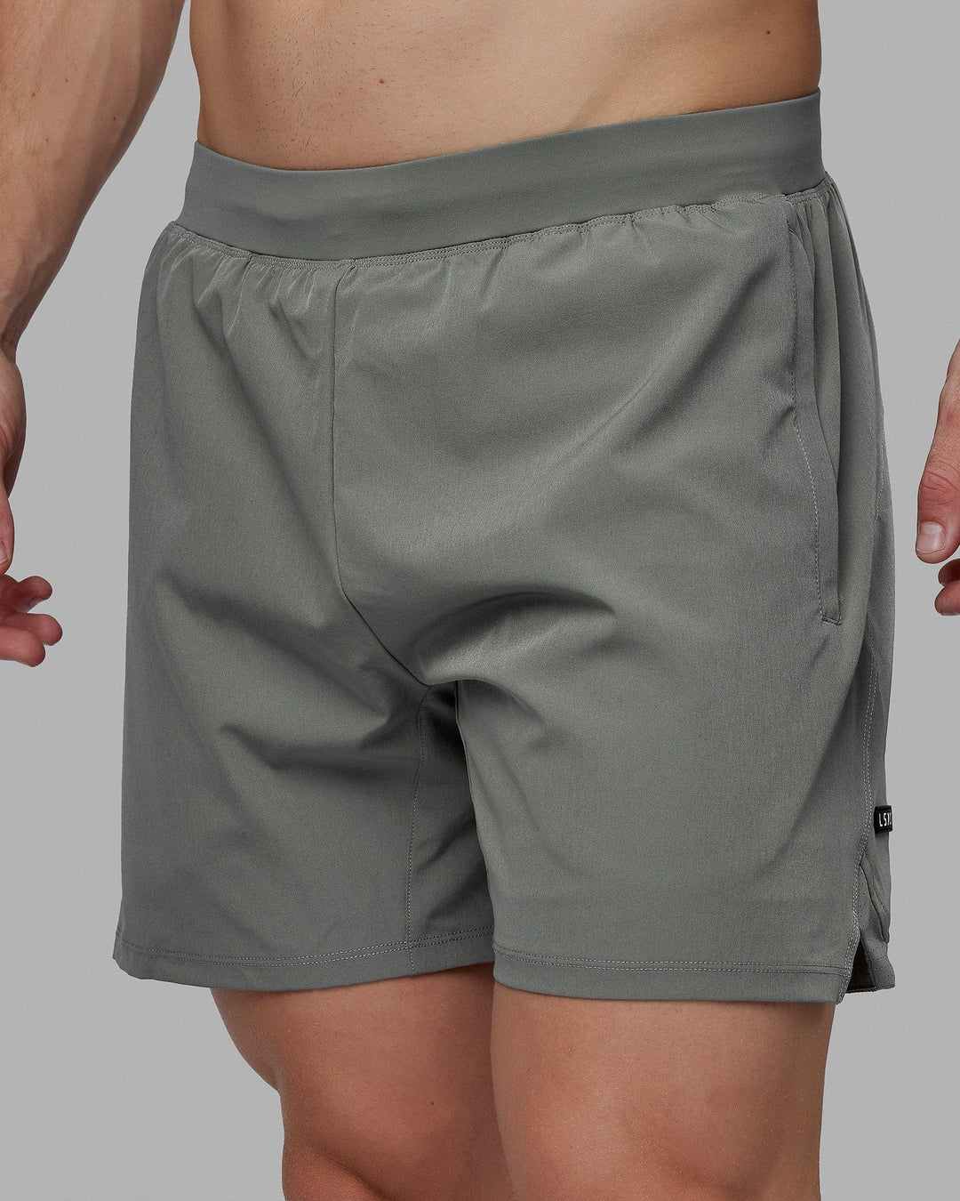 Man wearing Challenger 6" Performance Shorts - Graphite - view 1