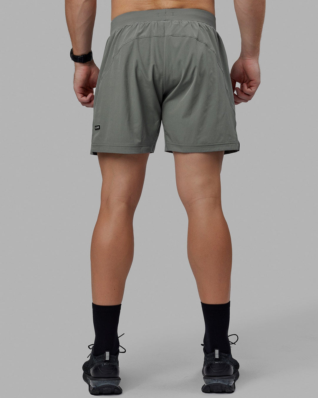 Man wearing Challenger 6" Performance Shorts - Graphite - view 4