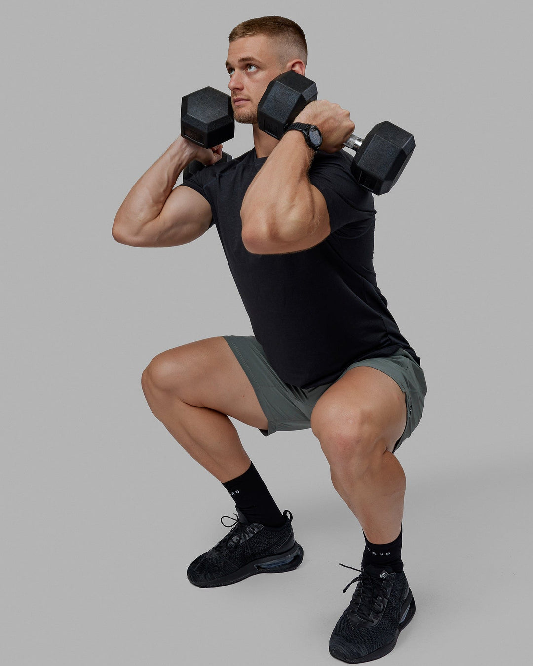 Man wearing Challenger 6" Performance Shorts - Graphite - view 6