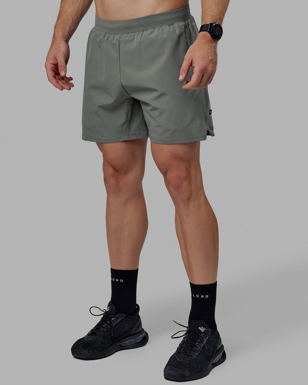 Man wearing Challenger 6" Performance Shorts - Graphite - view 7