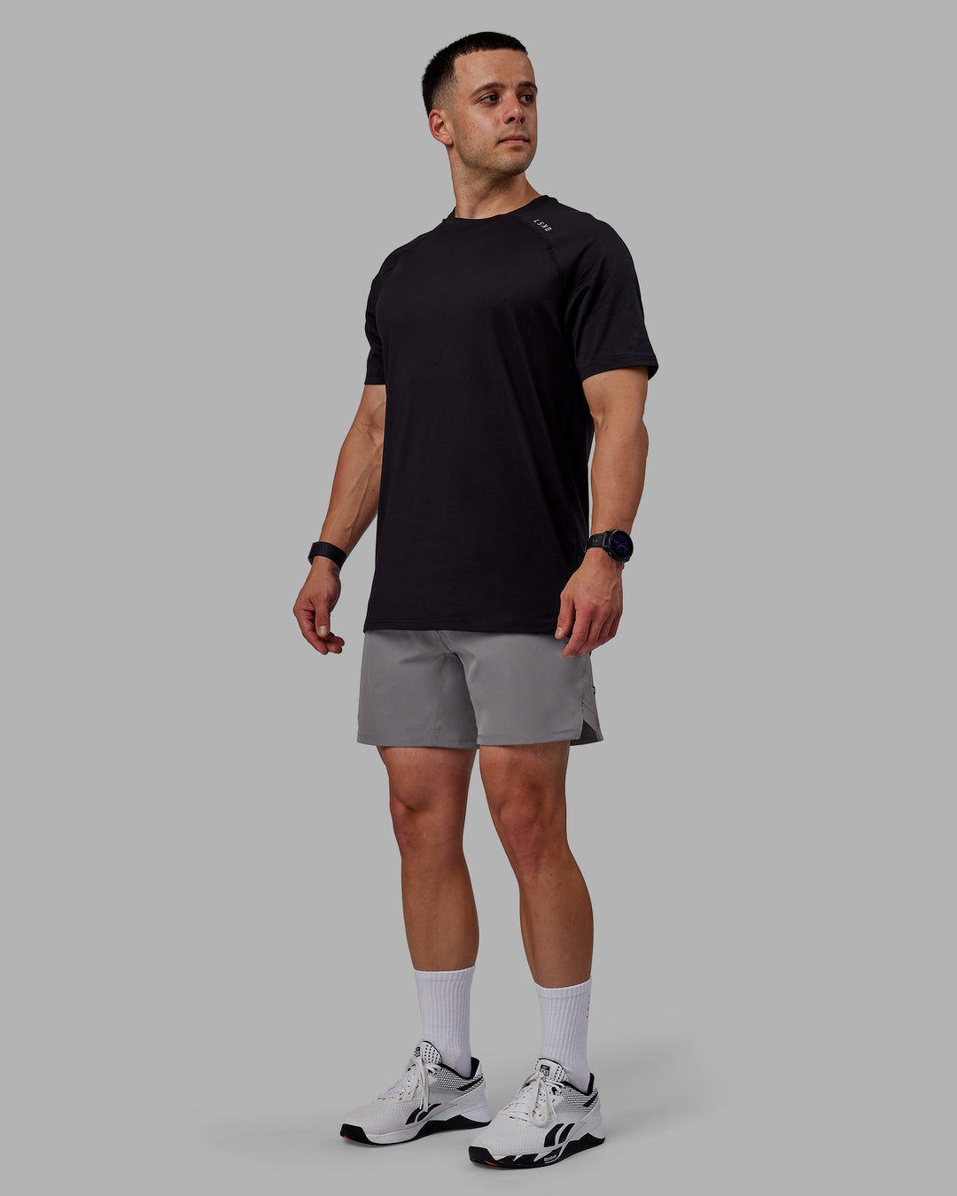 Man wearing Challenger 6" Performance Shorts - Storm Front - view 5