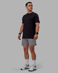 Man wearing Challenger 6" Performance Shorts - Storm Front | Thumbnail Index: 4