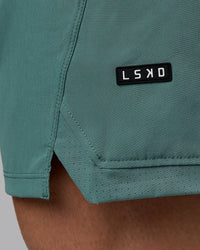 Man wearing Challenger 6" Performance Shorts - Sagebrush | Thumbnail Index: 4
