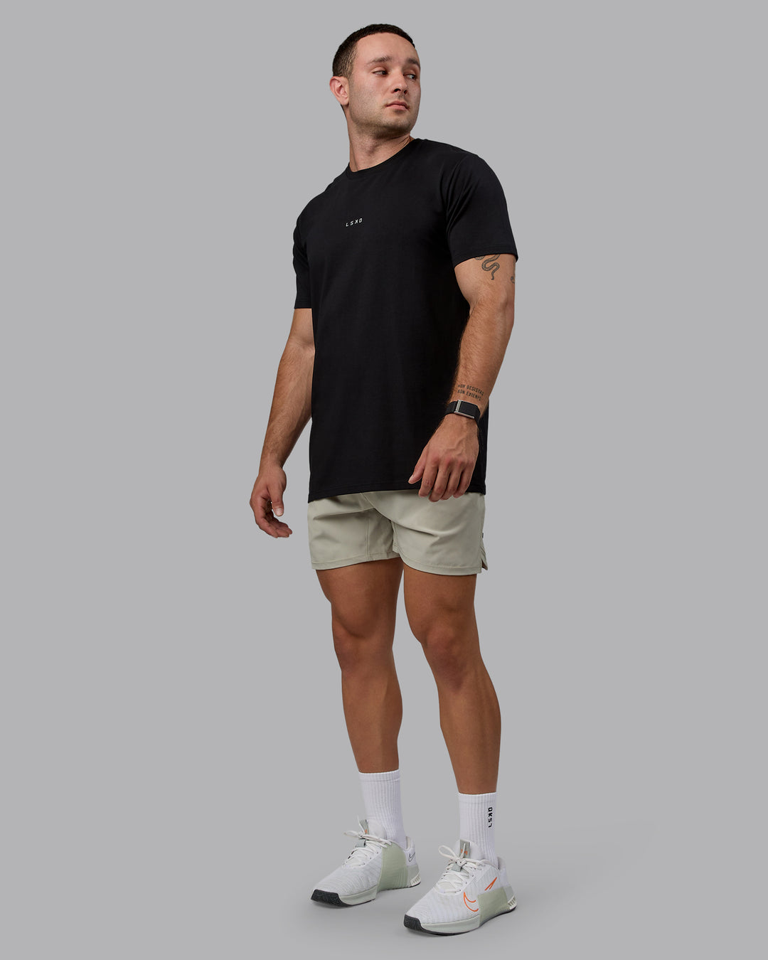Man wearing Challenger 6" Performance Shorts - Sustained Grey - view 5