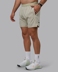 Man wearing Challenger 6" Performance Shorts - Sustained Grey | Thumbnail Index: 6