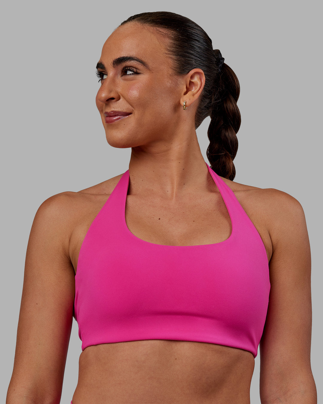Woman wearing Challenger Sports Bra - Fuchsia Pink - view 3