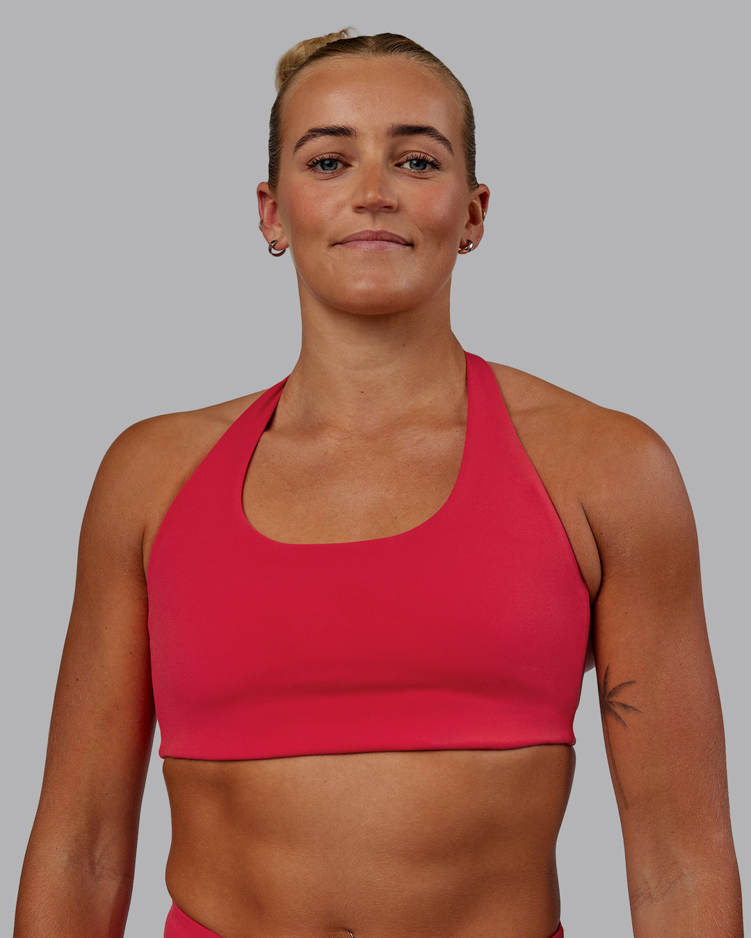 Woman wearing Challenger Sports Bra - Scarlet - view 5