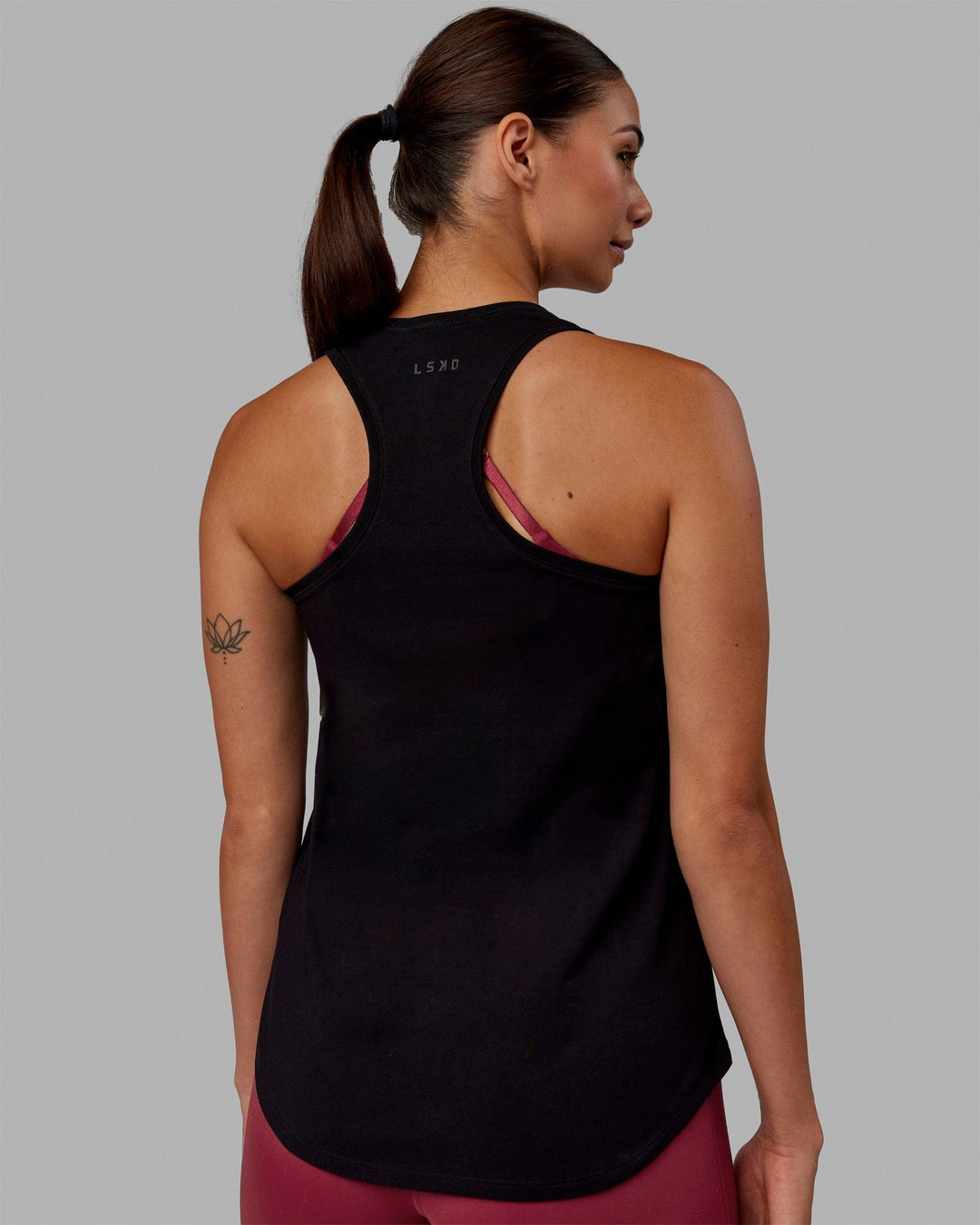 Woman wearing Charge PimaFLX-Lite Active Tank - Black - view 4