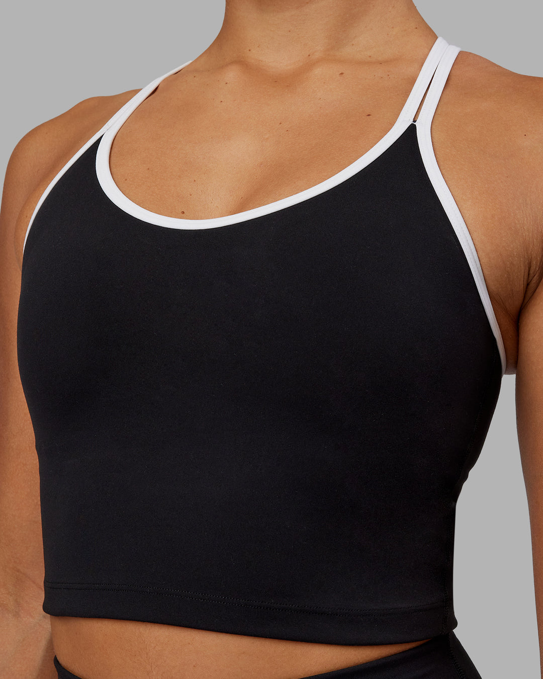 Woman wearing Contrast Active Shelf Bra Tank - Black-White - view 4