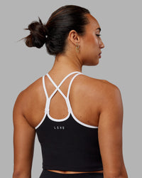 Woman wearing Contrast Active Shelf Bra Tank - Black-White | Thumbnail Index: 1