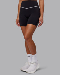 Woman wearing Contrast Ultra High-Rise 6" Short - Black-White | Thumbnail Index: 0
