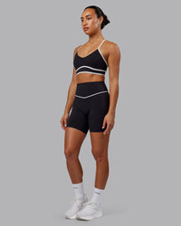 Woman wearing Contrast Sports Bra - Black-White | Thumbnail Index: 5