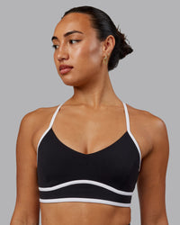 Woman wearing Contrast Sports Bra - Black-White | Thumbnail Index: 2
