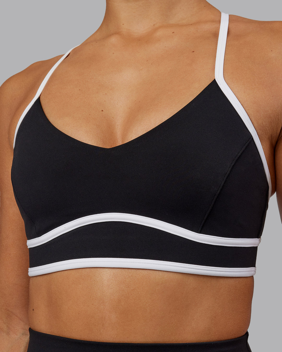 Woman wearing Contrast Sports Bra - Black-White - view 5