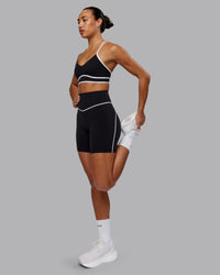 Woman wearing Contrast Sports Bra - Black-White | Thumbnail Index: 7