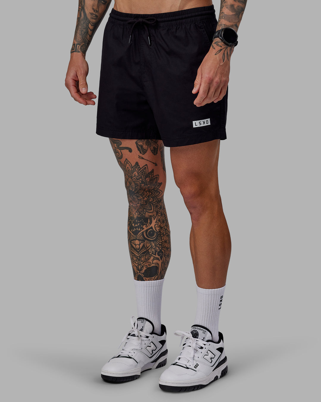 Man wearing Daily 5" Shorts - Black-White - view 6