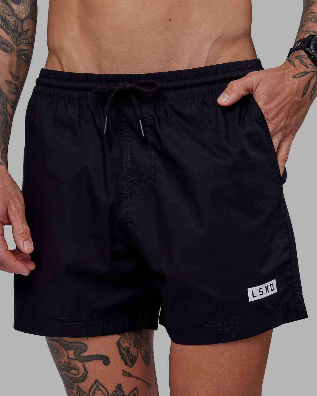 Man wearing Daily 5" Shorts - Black-White - view 1