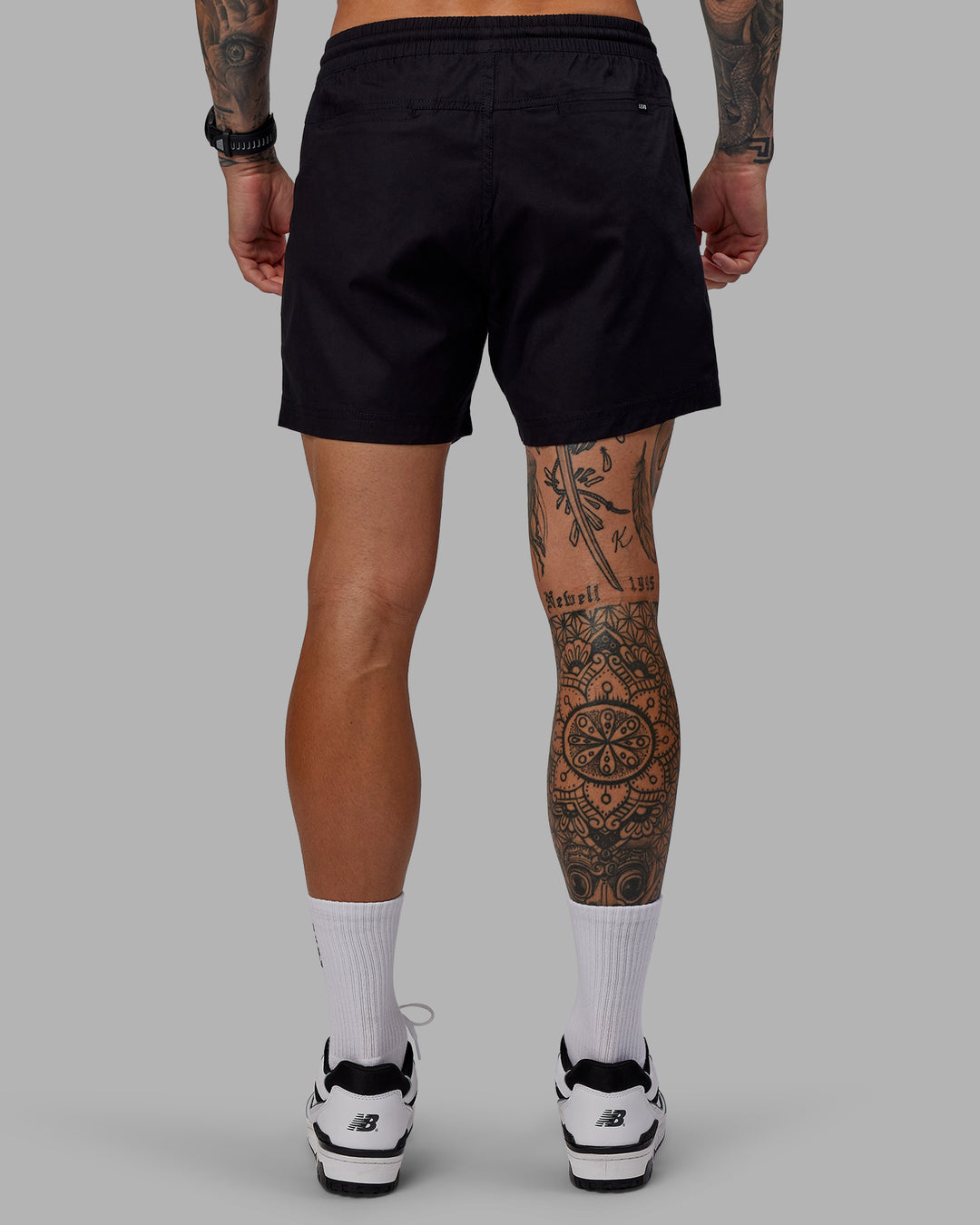 Man wearing Daily 5" Shorts - Black-White - view 4