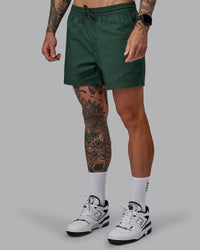 Man wearing Daily 5" Shorts - Cilantro | Thumbnail Index: 5