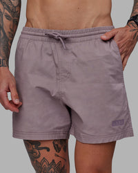 Man wearing Daily 5" Shorts - Grey Purple | Thumbnail Index: 0