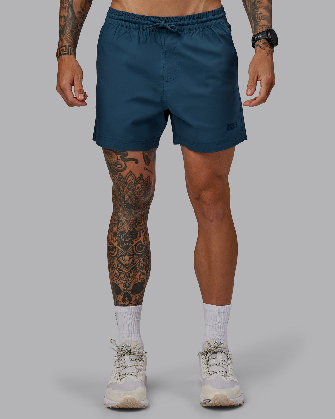 Man wearing Daily 5" Shorts - Indigo - view 1