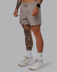 Man wearing Daily 5" Shorts - Shale Beige | Thumbnail Index: 5