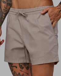 Man wearing Daily 5" Shorts - Shale Beige | Thumbnail Index: 2
