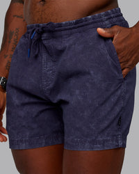 Man wearing Washed Daily 5" Shorts - Midnight Blue | Thumbnail Index: 1