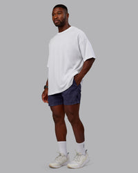 Man wearing Washed Daily 5" Shorts - Midnight Blue | Thumbnail Index: 2