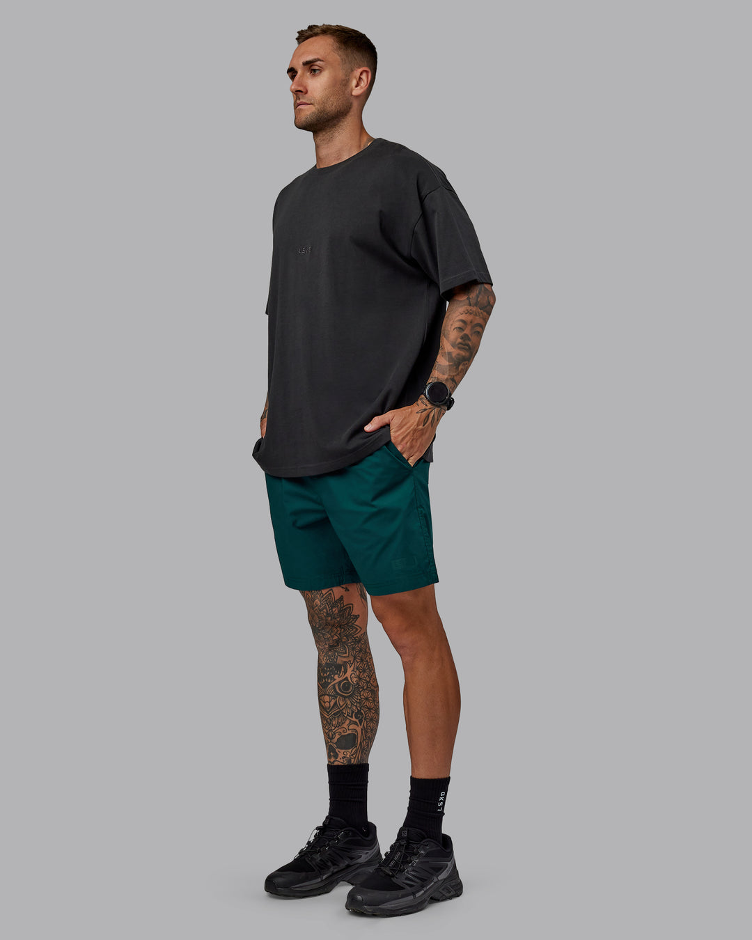 Man wearing Daily 7" Shorts - Dark Moss - view 5