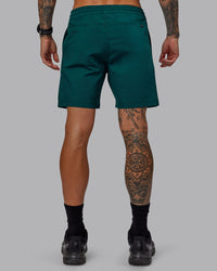 Man wearing Daily 7" Shorts - Dark Moss | Thumbnail Index: 3