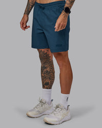 Man wearing Daily 7" Shorts - Indigo | Thumbnail Index: 5
