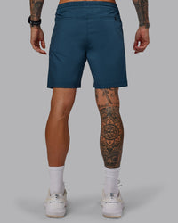 Man wearing Daily 7" Shorts - Indigo | Thumbnail Index: 3