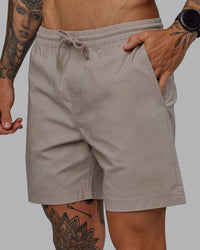 Man wearing Daily 7" Shorts - Shale Beige | Thumbnail Index: 2