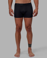 Man wearing daily trunks - black. | Thumbnail Index: 11