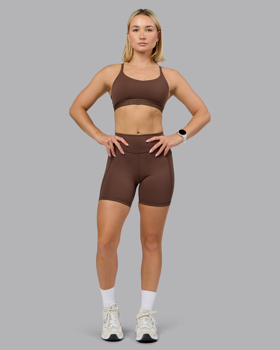 Woman wearing Define Sports Bra - Chocolate Martini | Model:Halle | Size:S - view 4