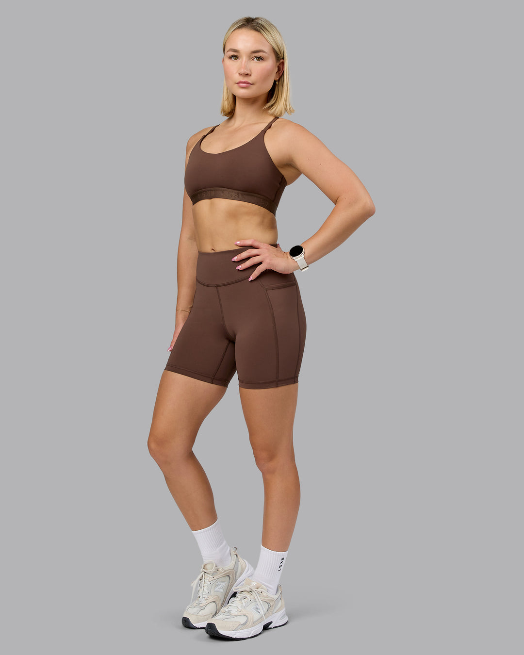 Woman wearing Define Sports Bra - Chocolate Martini | Model:Halle | Size:S - view 6