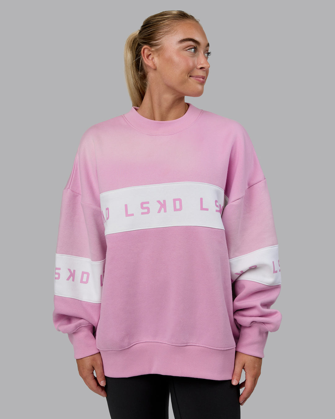 Woman wearing Disc Oversized Sweater - Bubblegum-Light Bubblegum - view 1