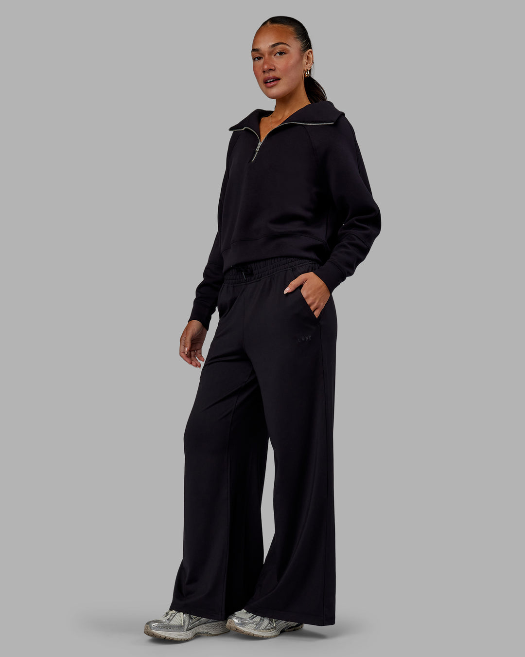 Woman wearing Elevate SoftTouch 1/2 Zip Sweater - Black-Black - view 2