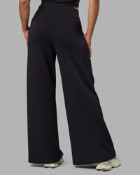 Woman wearing Elevate SoftTouch Wide Leg Pants - Black-Black | Thumbnail Index: 2