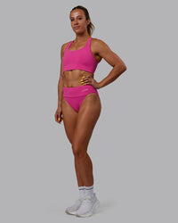 Woman wearing Elevate Sprinting Briefs - Fuchsia Pink | Thumbnail Index: 6