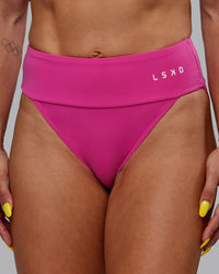 Woman wearing Elevate Sprinting Briefs - Fuchsia Pink | Thumbnail Index: 1