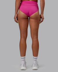 Woman wearing Elevate Sprinting Briefs - Fuchsia Pink | Thumbnail Index: 3