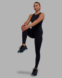 Woman wearing Elite High-Rise Full Length Legging Pockets - Black | Thumbnail Index: 8