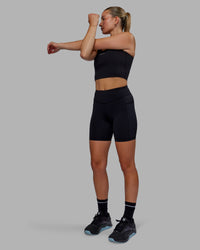 Woman wearing Elite High-Rise 6" Short Pockets - Black | Thumbnail Index: 11
