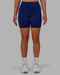 Woman wearing Elite High-Rise 6" Short Pockets - Midnight Blue | Thumbnail Index: 6